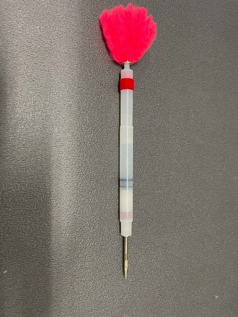 Patented dart for injecting animal micro chip for number ID.